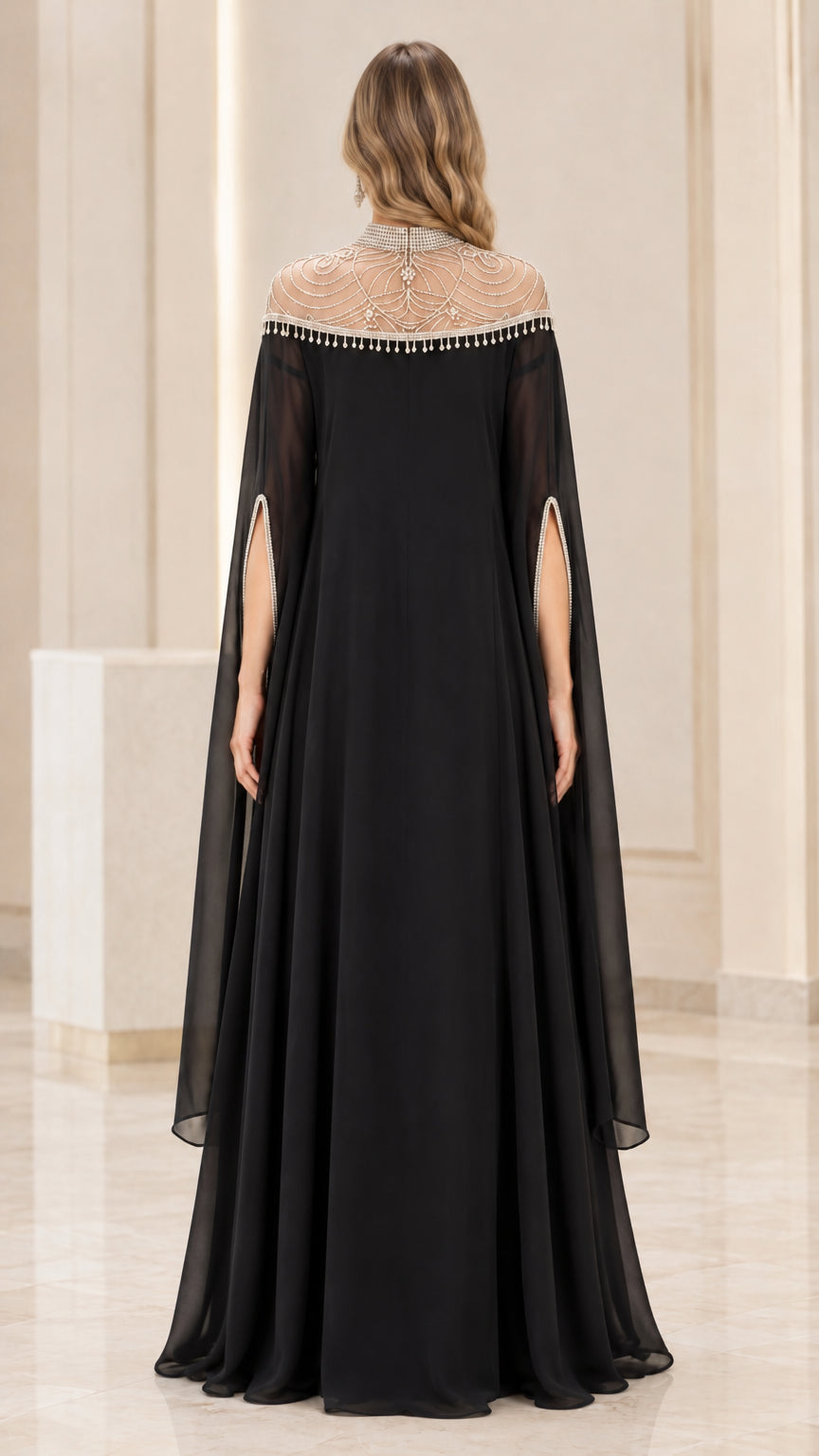 Back view of black split cape sleeve evening dress with high illusion collar