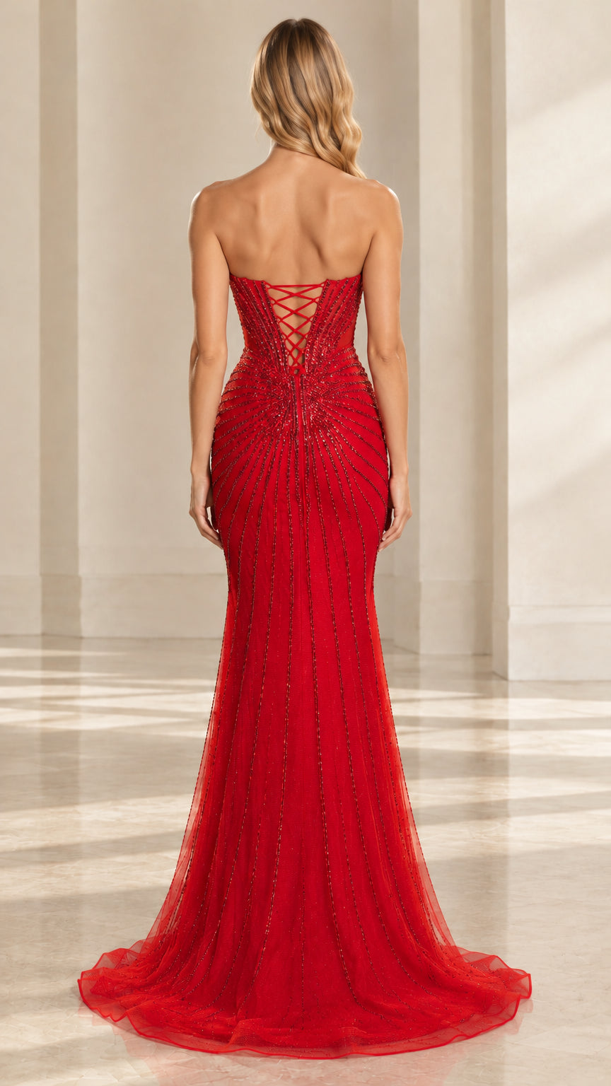 Rear view of the red evening gown showing the lace-up corset back and sweep train