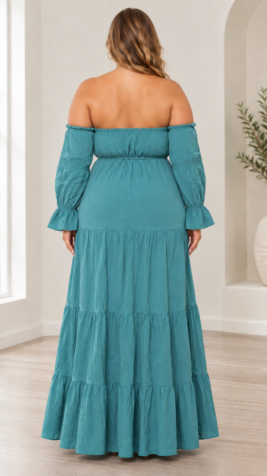 Back view of model wearing teal off-the-shoulder tiered maxi dress
