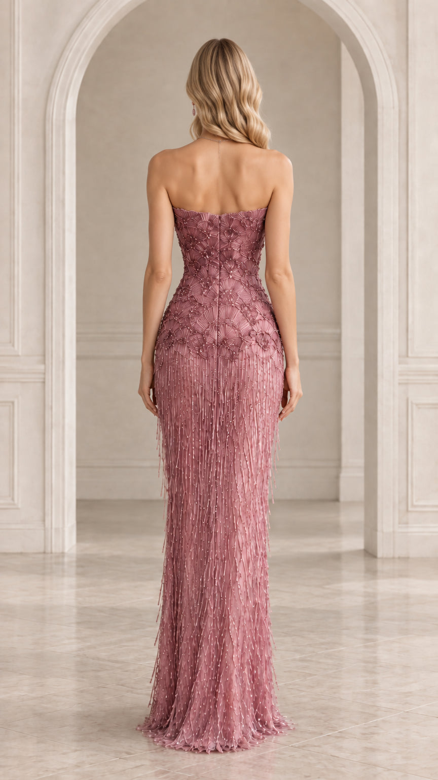 Back view of strapless dusty rose evening gown showing rear zipper closure