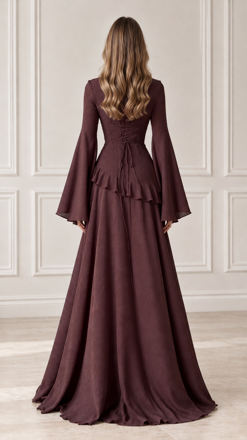 Back full-length view showing the corset-style lace-up tie back of the burgundy maxi dress