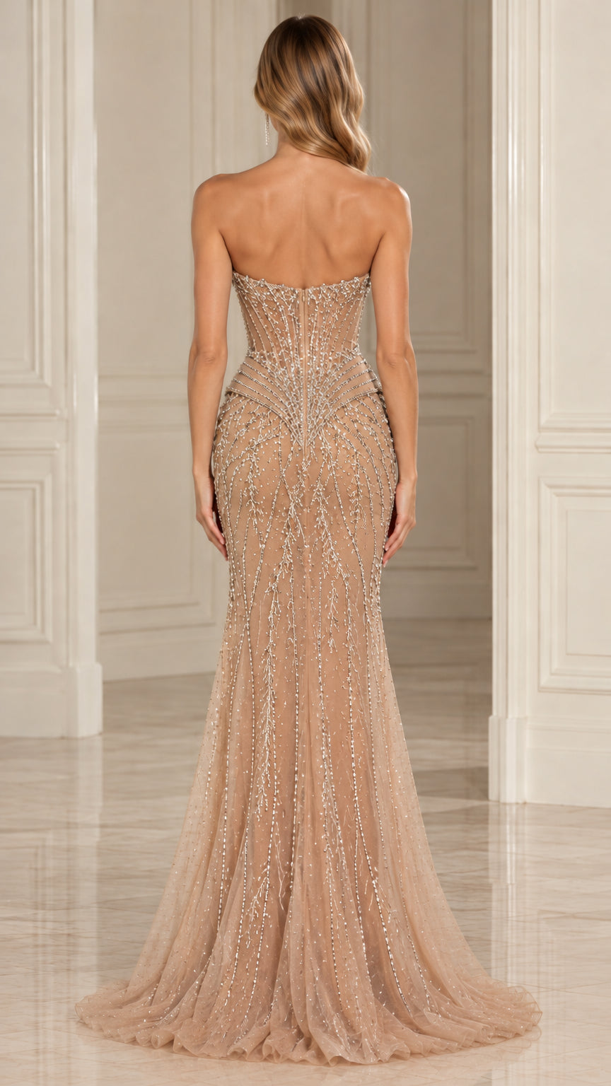 Back view of champagne strapless mermaid evening dress showing fitted corset back