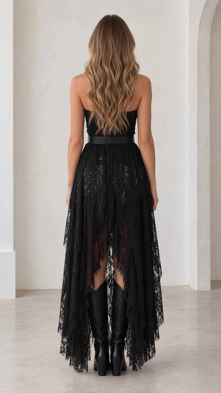 Back view of model in black strapless lace maxi dress showing floor-length train