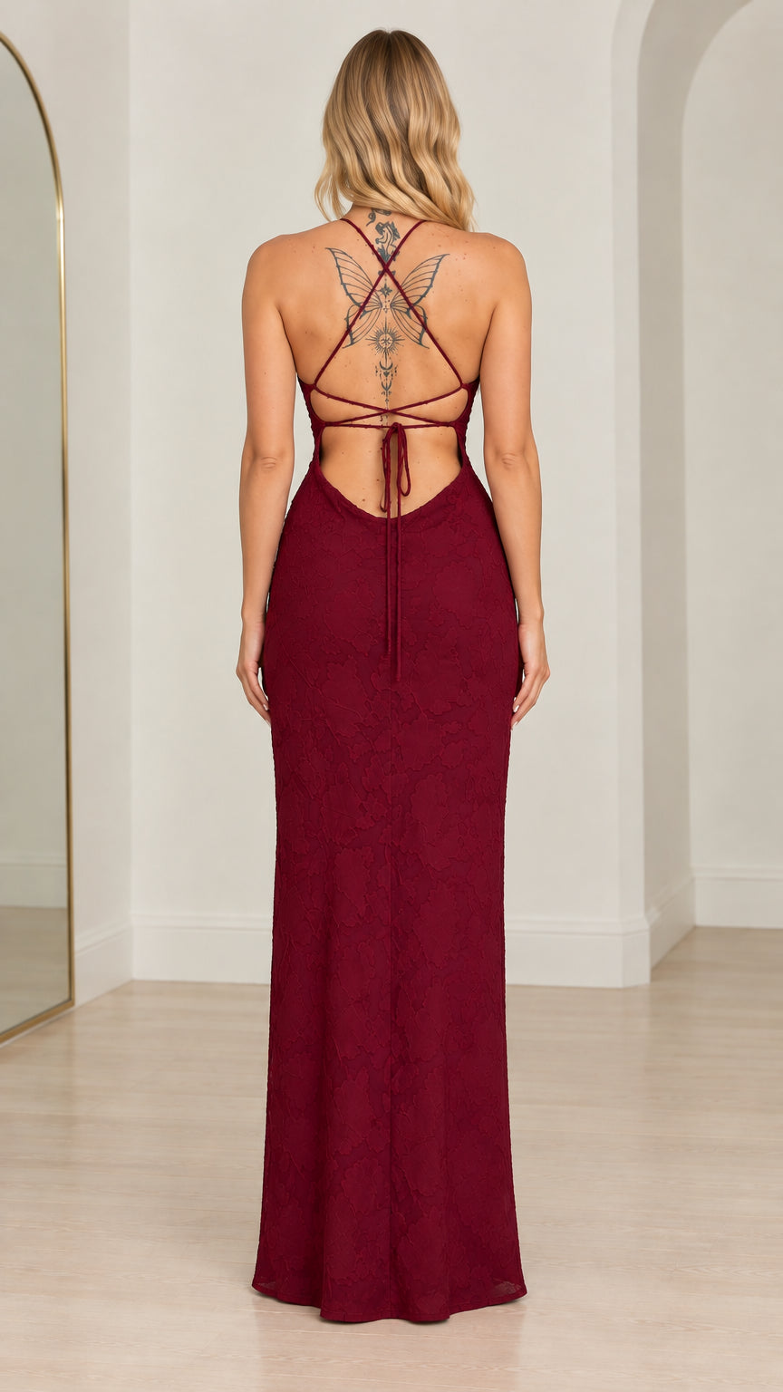 Back view of model highlighting open strappy lace-up tie back detail