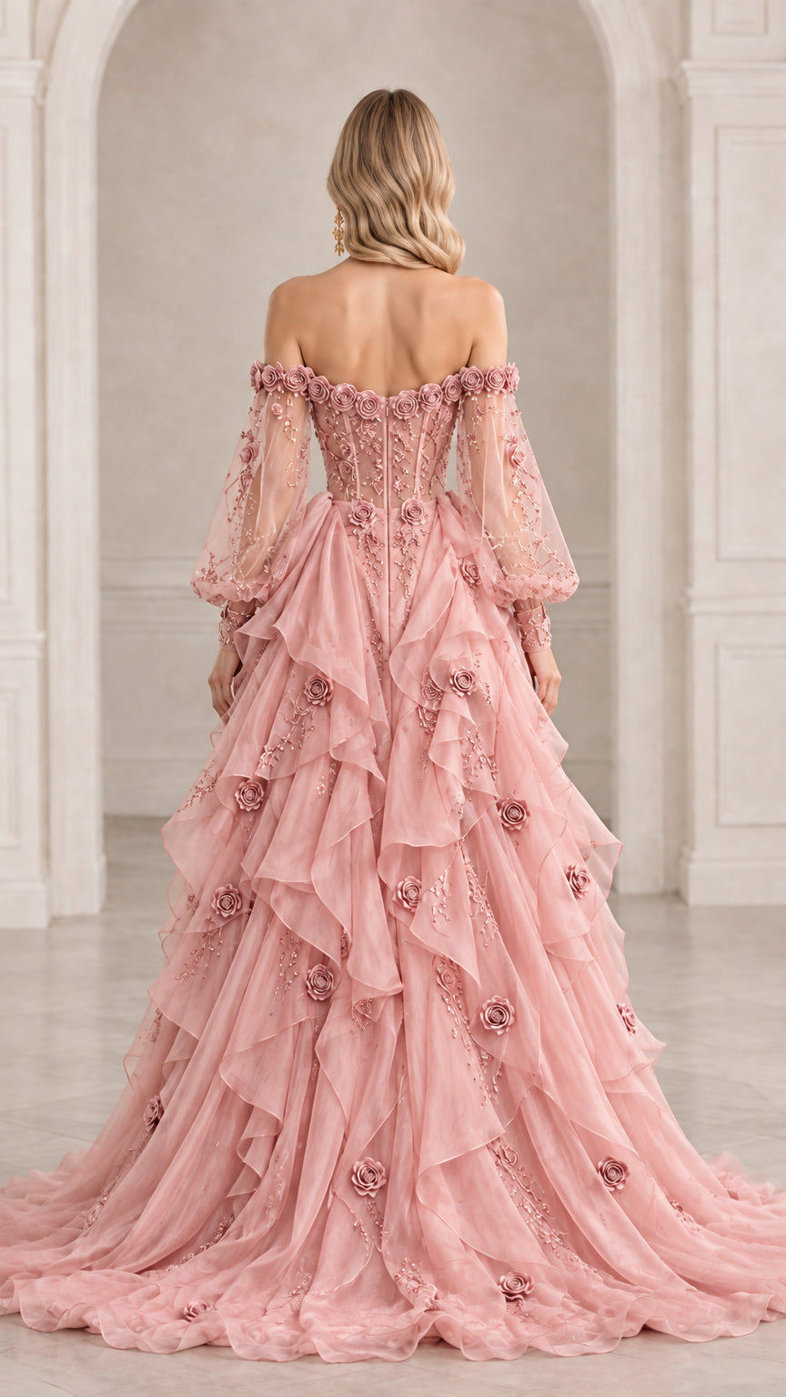 Back view of off-shoulder dusty pink formal gown featuring sheer corset detailing and train