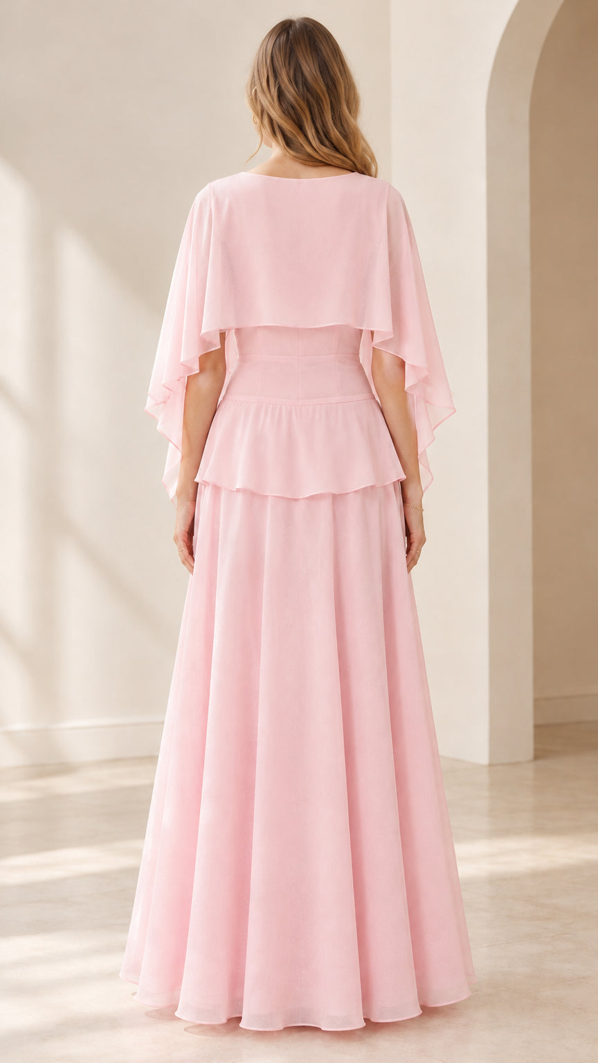 Back view of pink chiffon maxi gown with cape overlay and concealed zipper