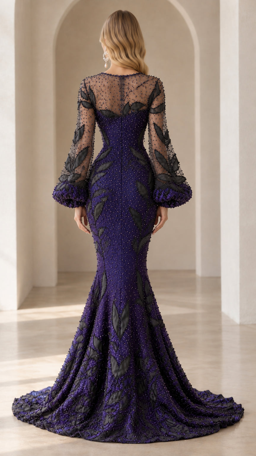 Back view of royal purple beaded evening gown showing illusion mesh back and sweeping train