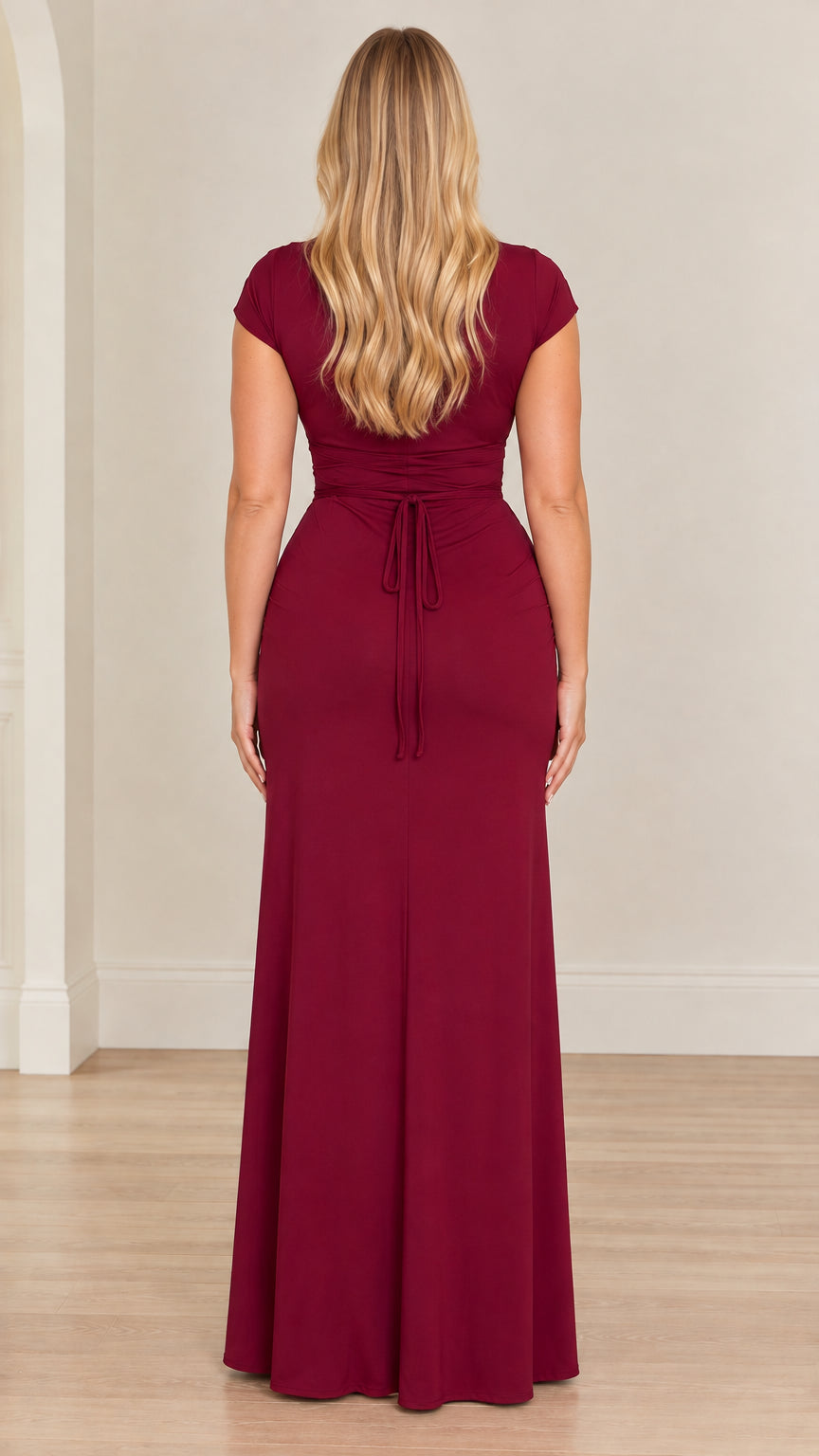 Back view of burgundy maxi dress showing tie back waist detail