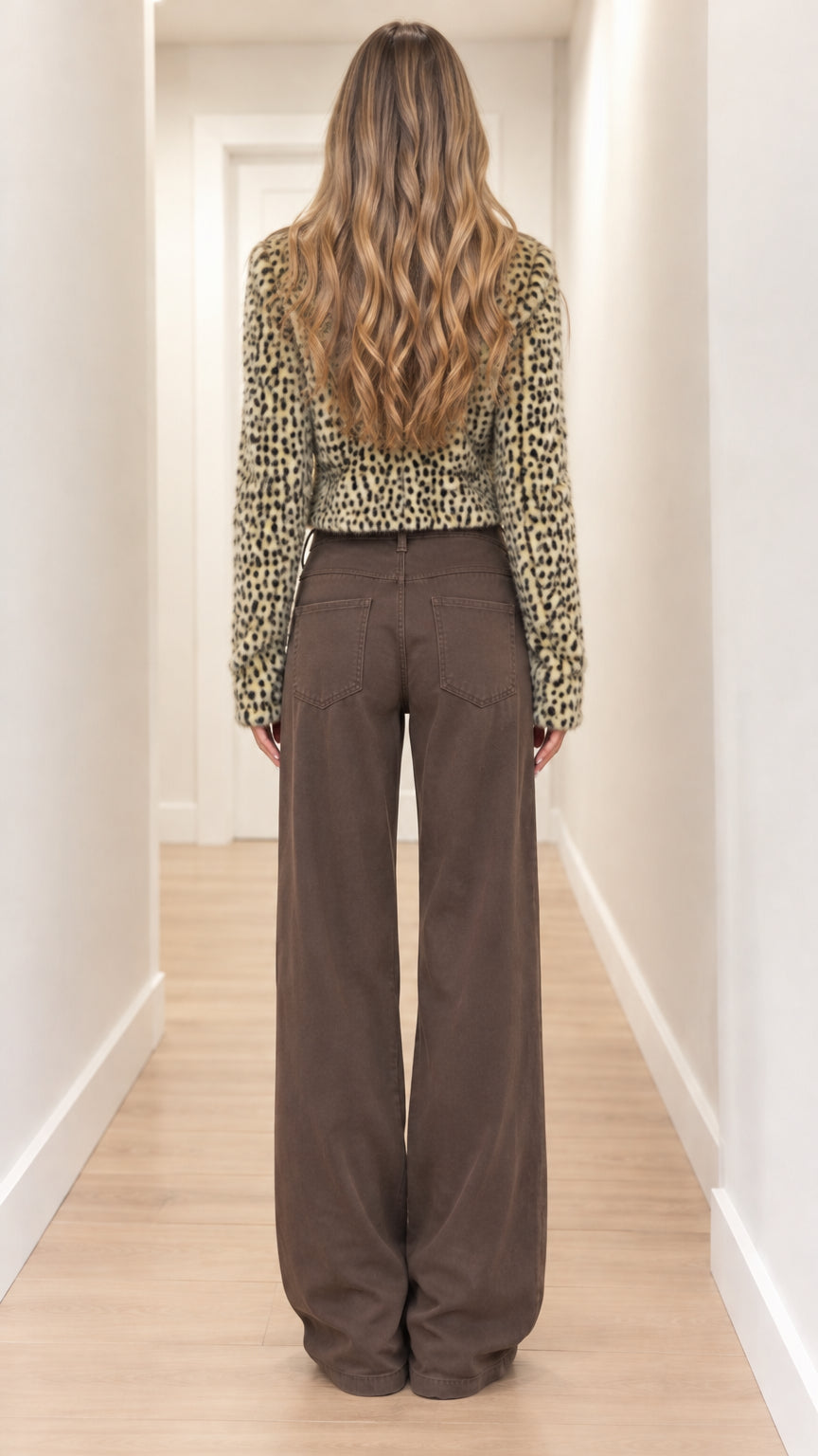 Back view of model wearing olive khaki leopard print cropped cardigan sweater