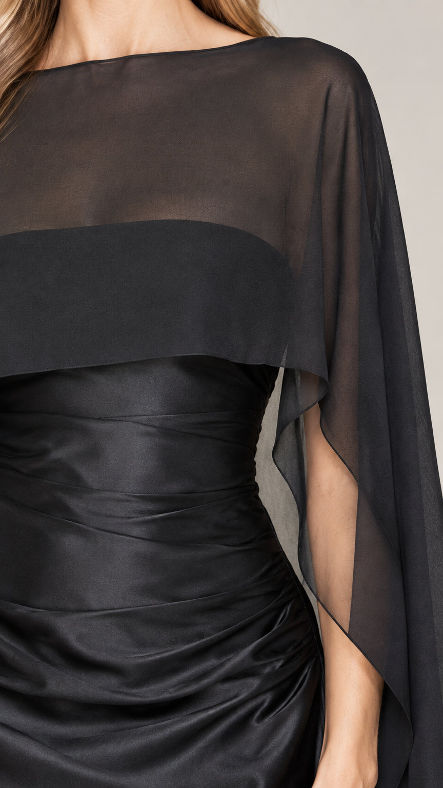 Close-up detail of ruching and satin fabric on black evening dress