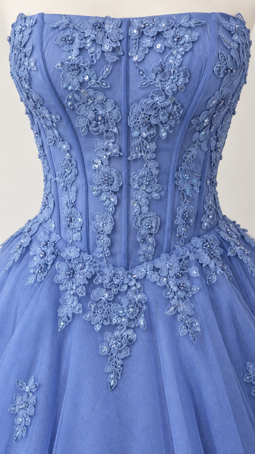 Close-up detail of blue corset bodice with intricate floral lace and beadwork