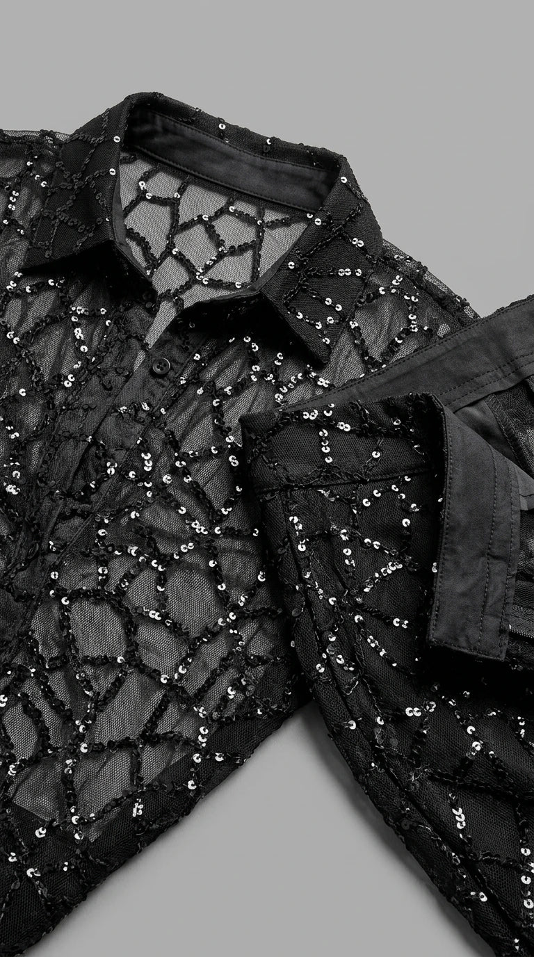 Close-up detail of the black sequin mesh fabric, collar, and button placket