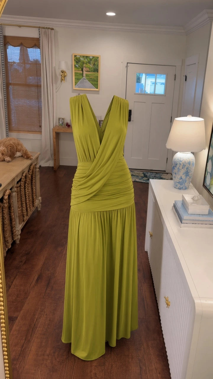 Mannequin display of olive green crossover plunge drape drop-waist maxi dress