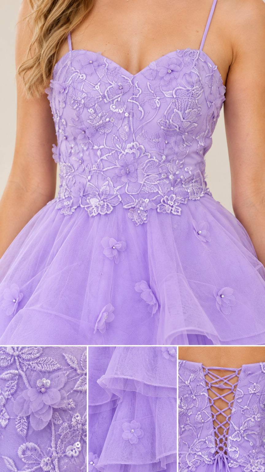Close-up details of floral embroidered bodice and tiered tulle texture