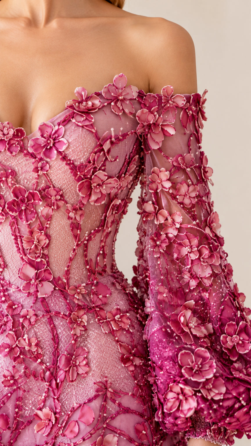 Close-up detail of 3D floral appliqué embellishments on bodice and sleeve