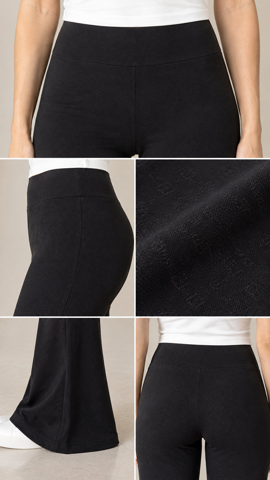 Close-up details of black flare pants showing high waistband, fabric texture, and wide bell-bottom hem