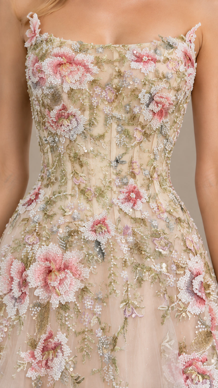 Close-up detail of floral embroidery and beading on corset bodice