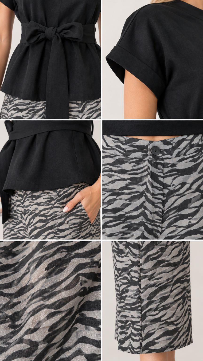 Close-up details of the waist tie, cuffed sleeve, pocket, and zebra print fabric