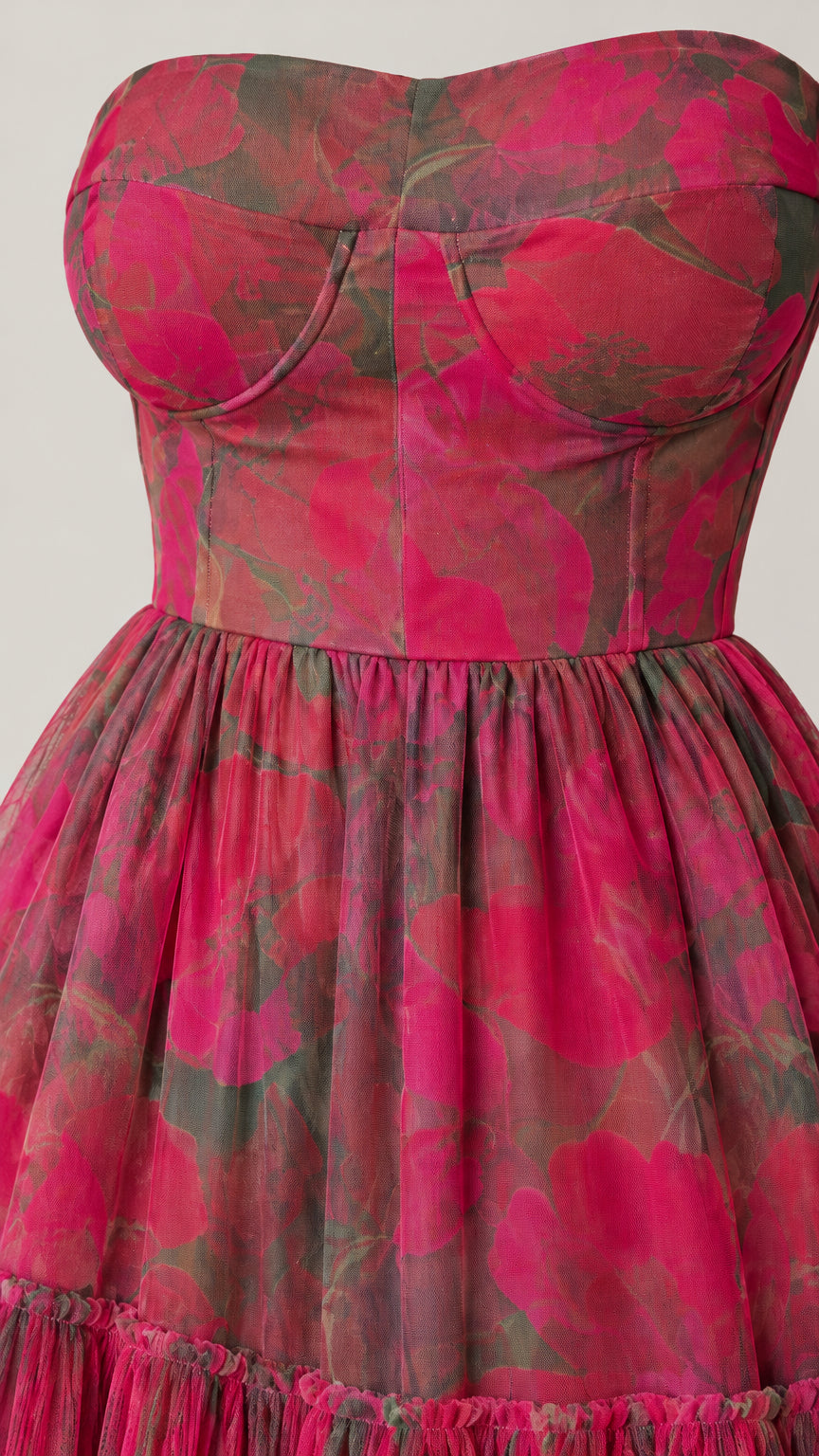 Close-up detail of sweetheart neckline and corset bodice on magenta floral dress