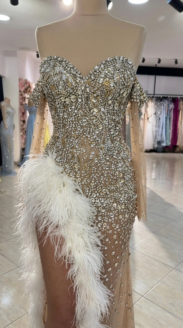Close-up detail of rhinestone sweetheart bodice and plush feather slit on mannequin