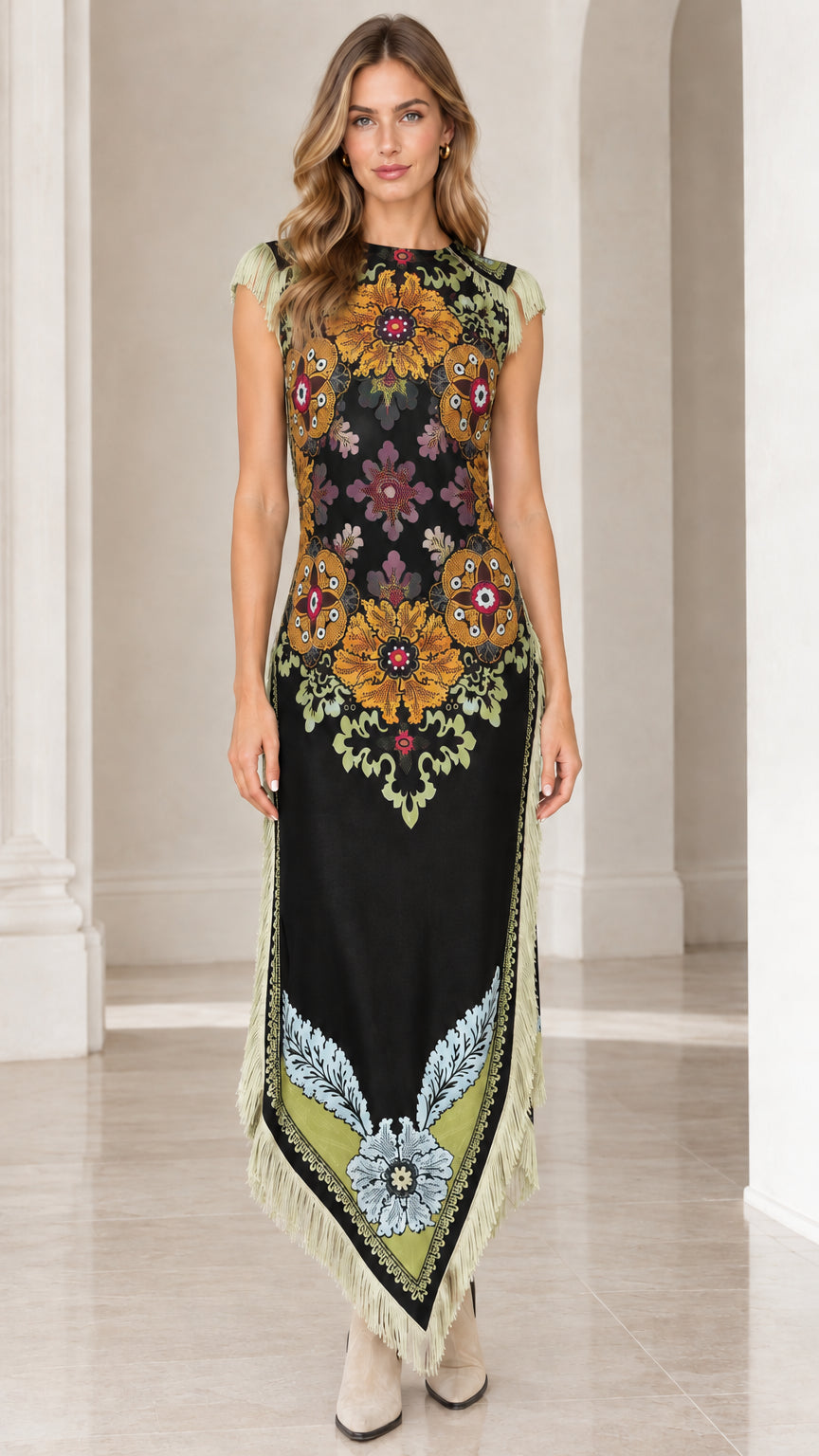 Black color variant of floral print sleeveless maxi dress with fringe handkerchief hem
