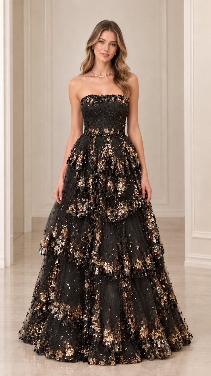Front view of black strapless tiered sequin ball gown