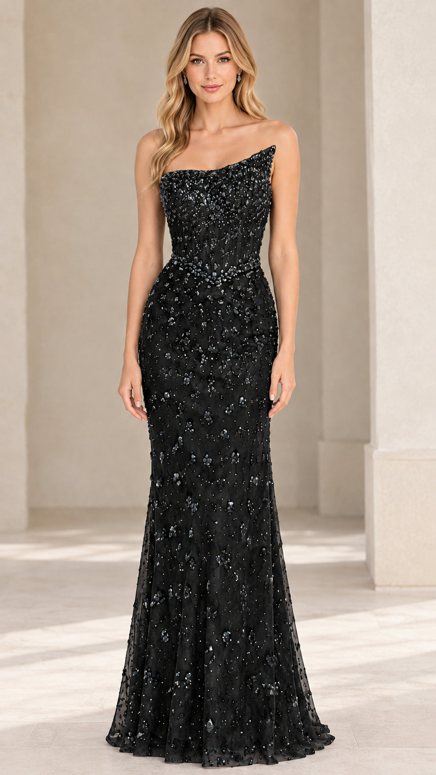 Front view of black beaded strapless evening gown