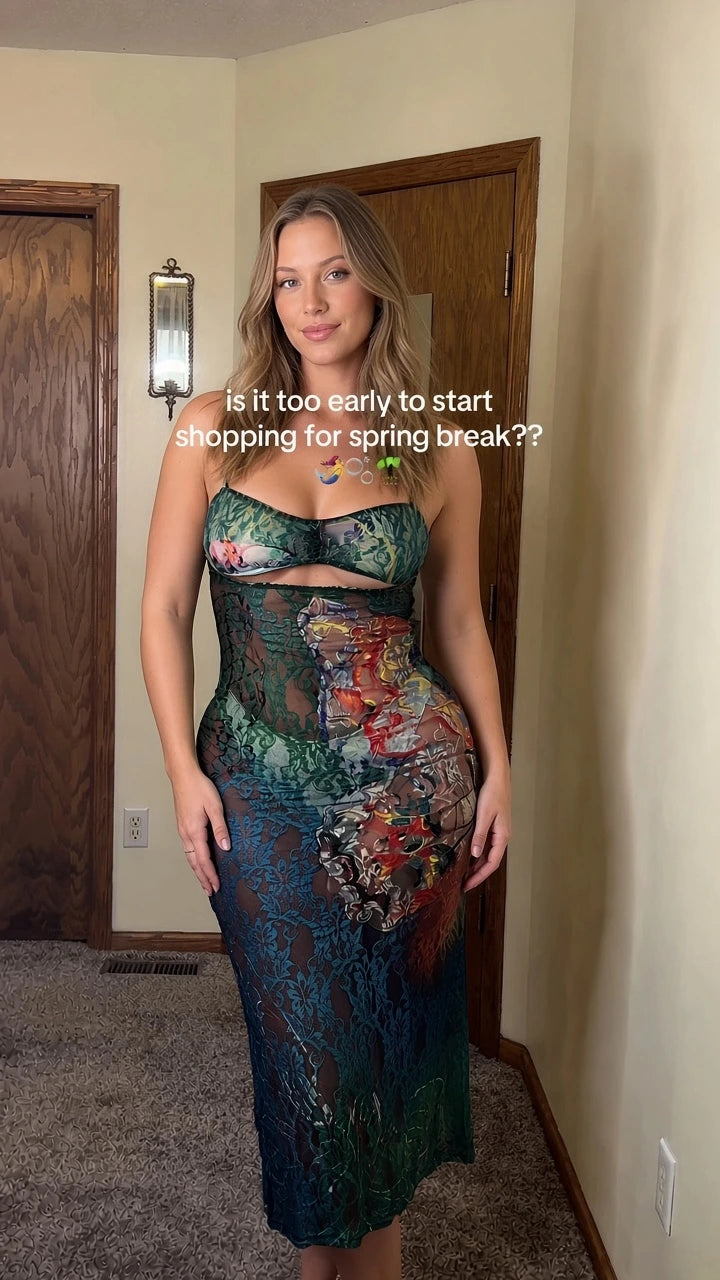Front view of model wearing Dark Green strapless floral lace cutout midi dress