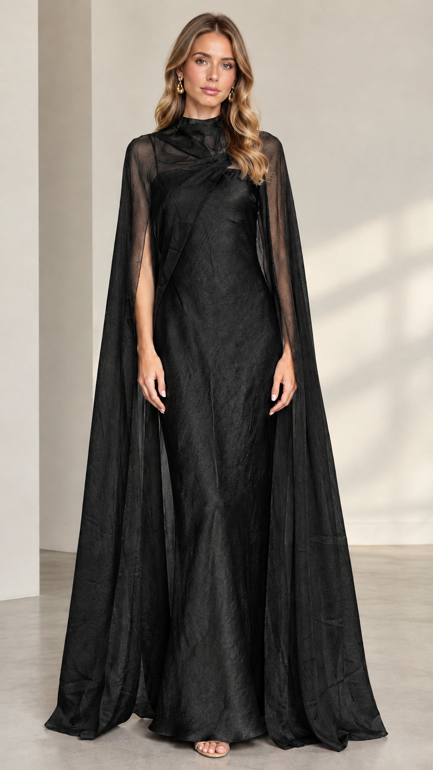 Black high neck maxi evening gown with sheer cape overlay