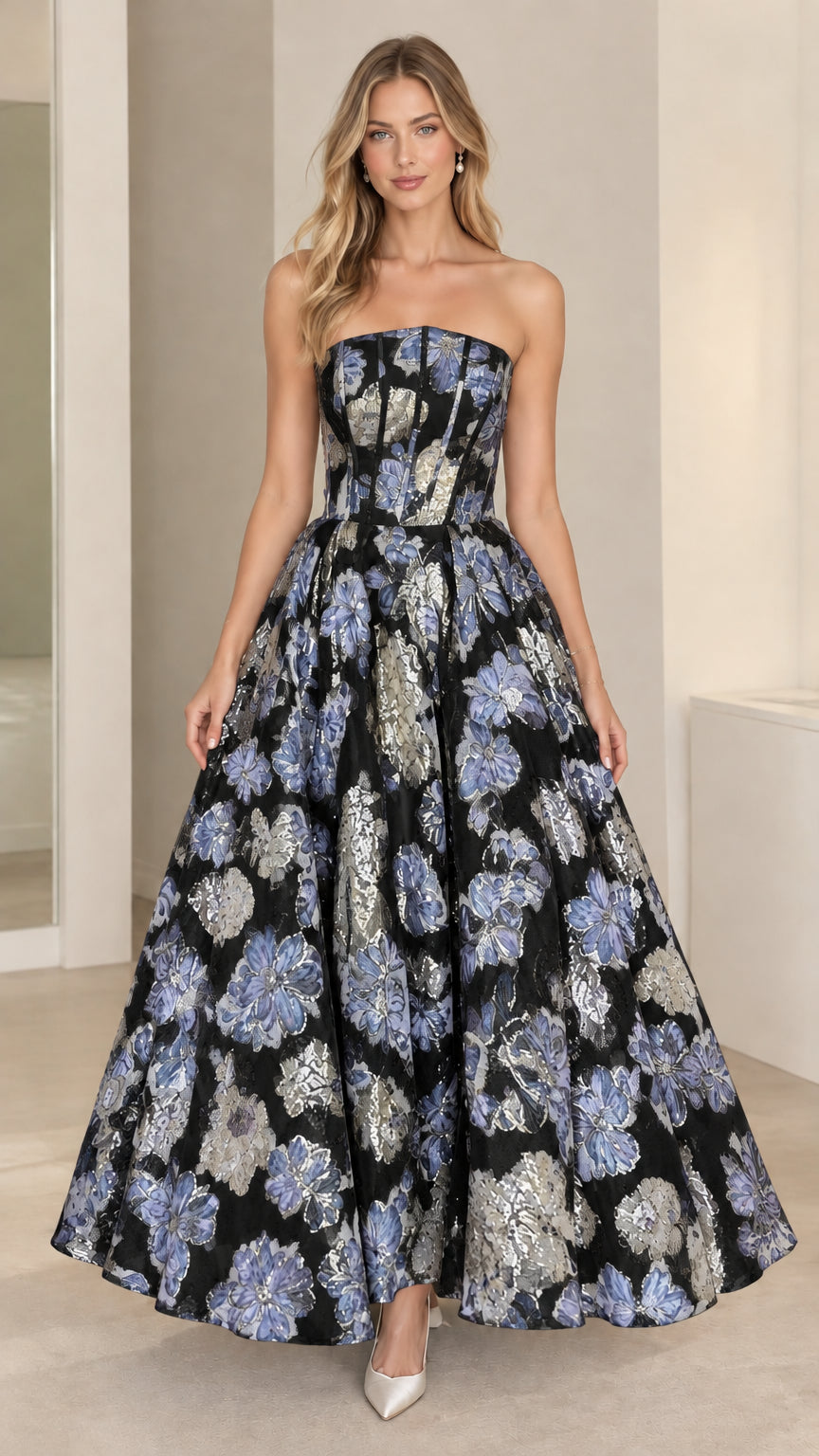 Full-length view of black and silver floral jacquard strapless evening gown
