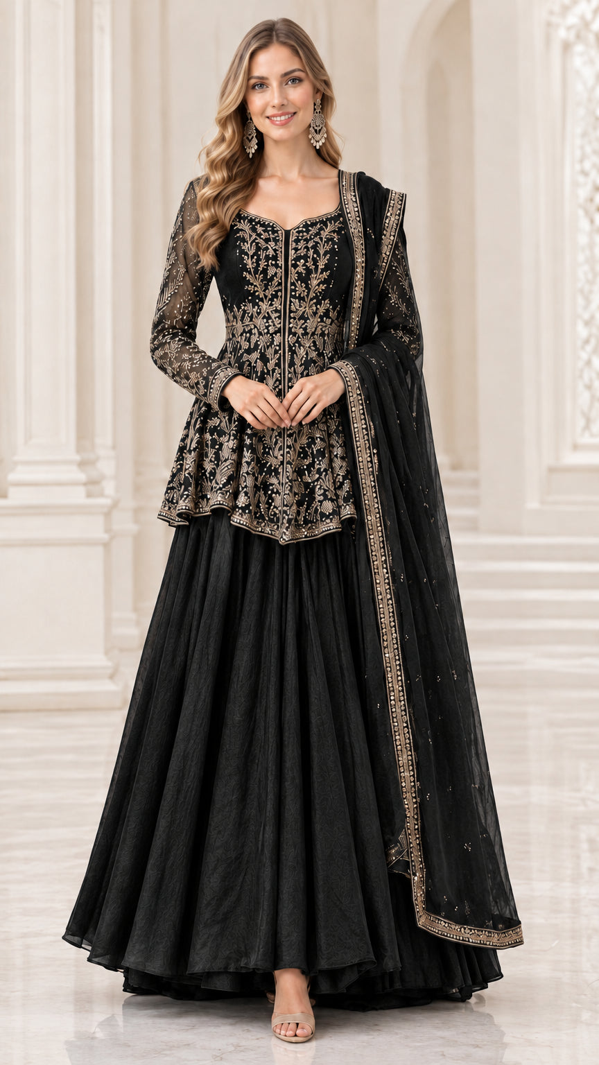 Model wearing black embroidered peplum top and flared maxi skirt set with dupatta