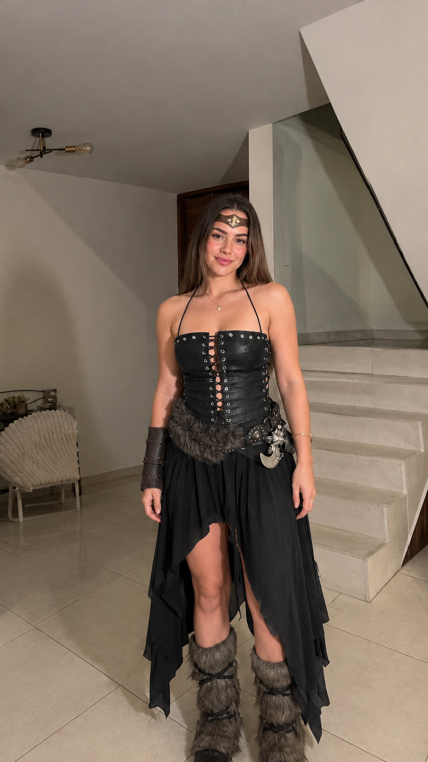 Woman wearing the black Viking warrior lace-up corset top and matching handkerchief skirt costume set