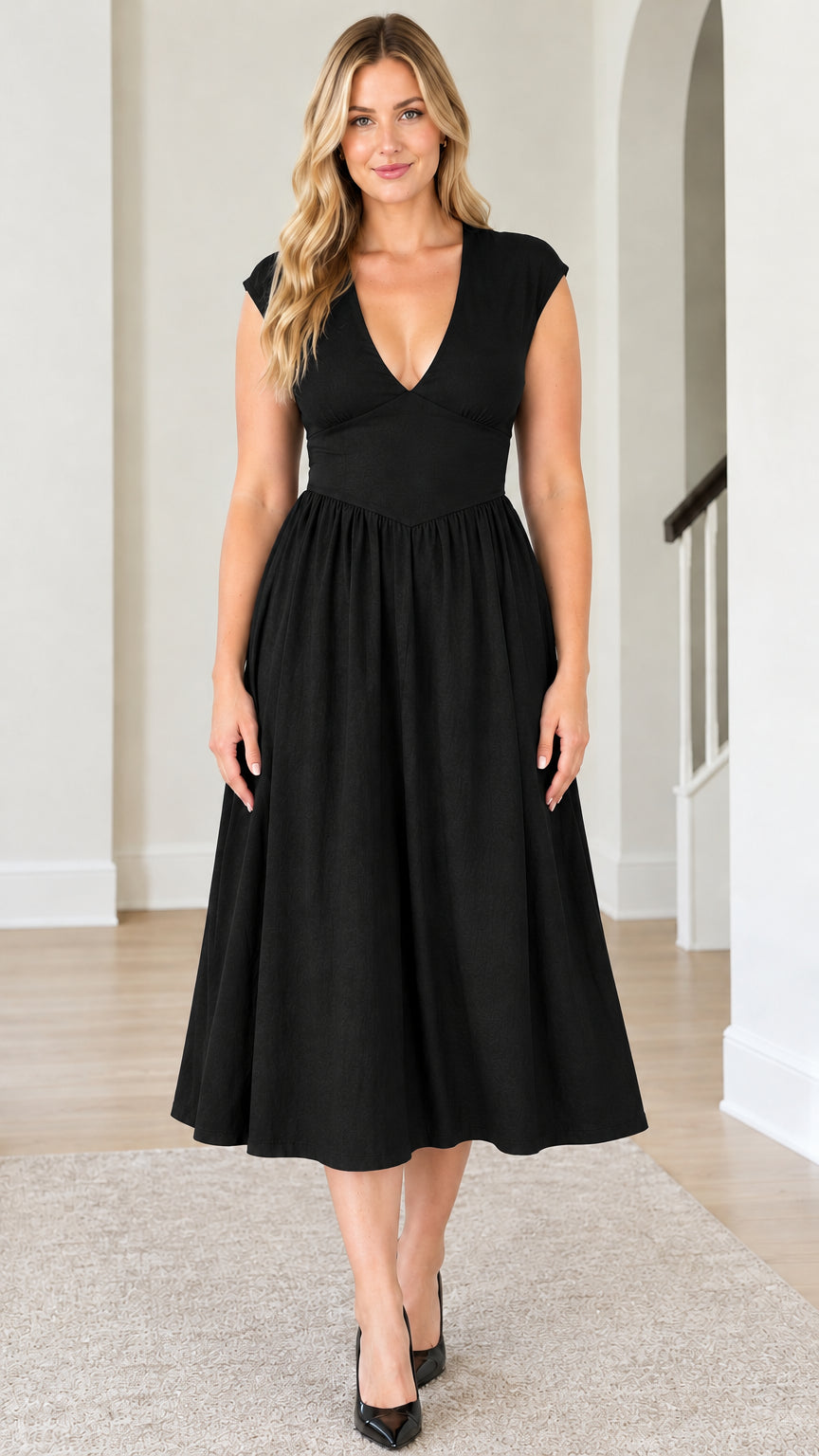 Front view of model wearing Black deep V-neck A-line midi dress