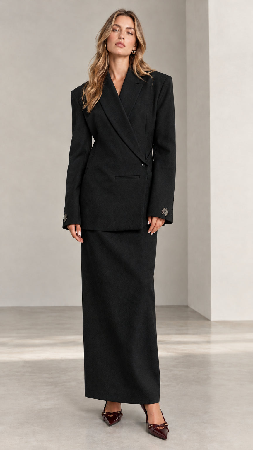 Full front view of Black tailored wrap blazer and maxi column skirt two-piece set