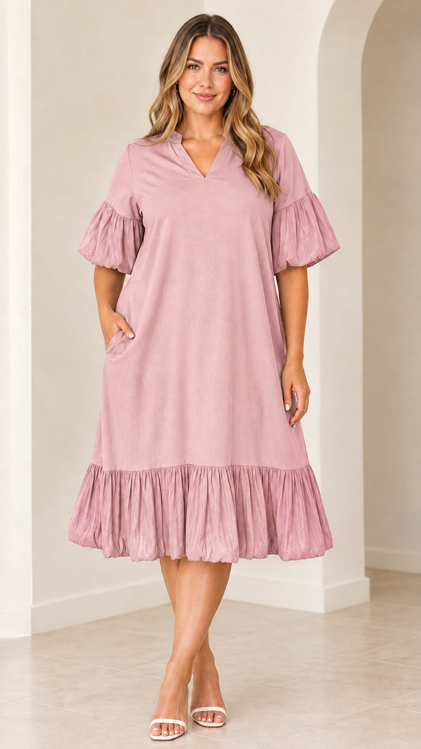 Model wearing dusty pink V-neck flutter sleeve tiered midi dress