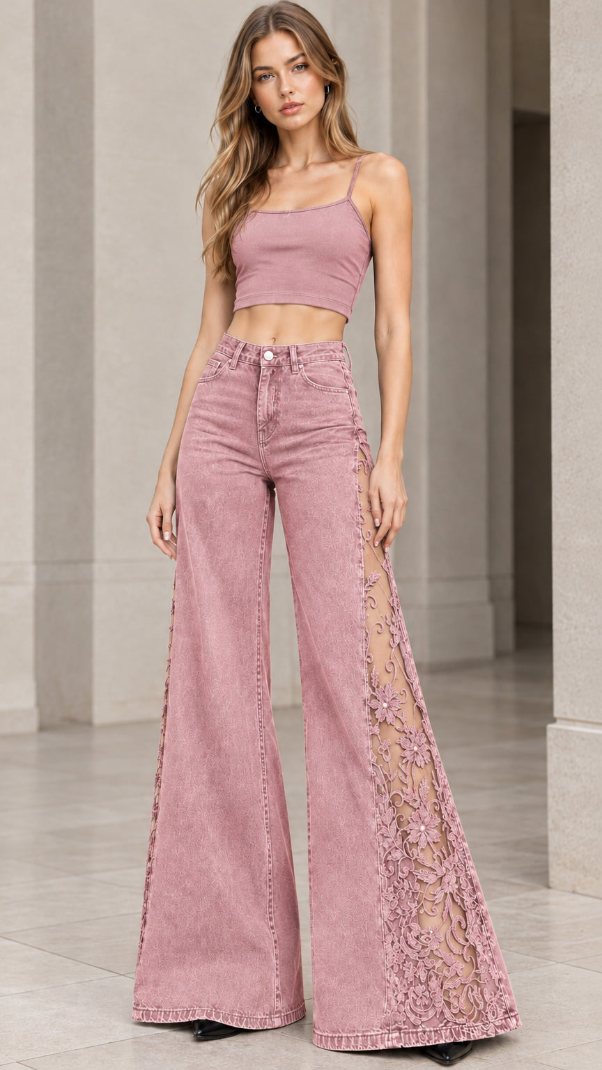 Front full-length view of model wearing dusty pink high-rise flare jeans with floral lace side panels