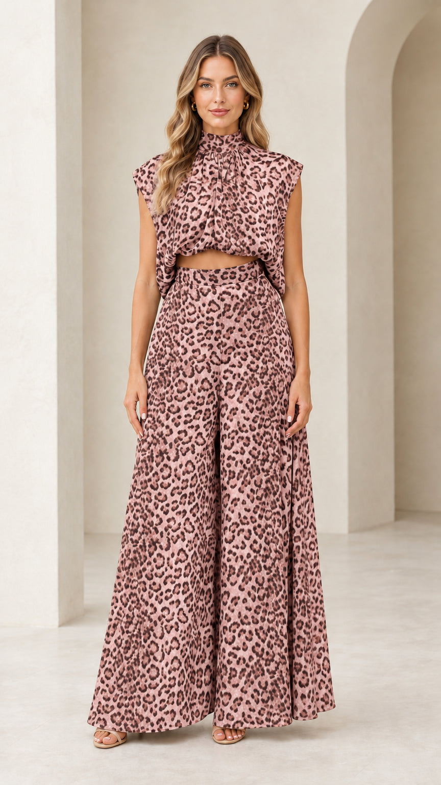 Front view of woman wearing dusty pink leopard print mock neck top and wide-leg pants set