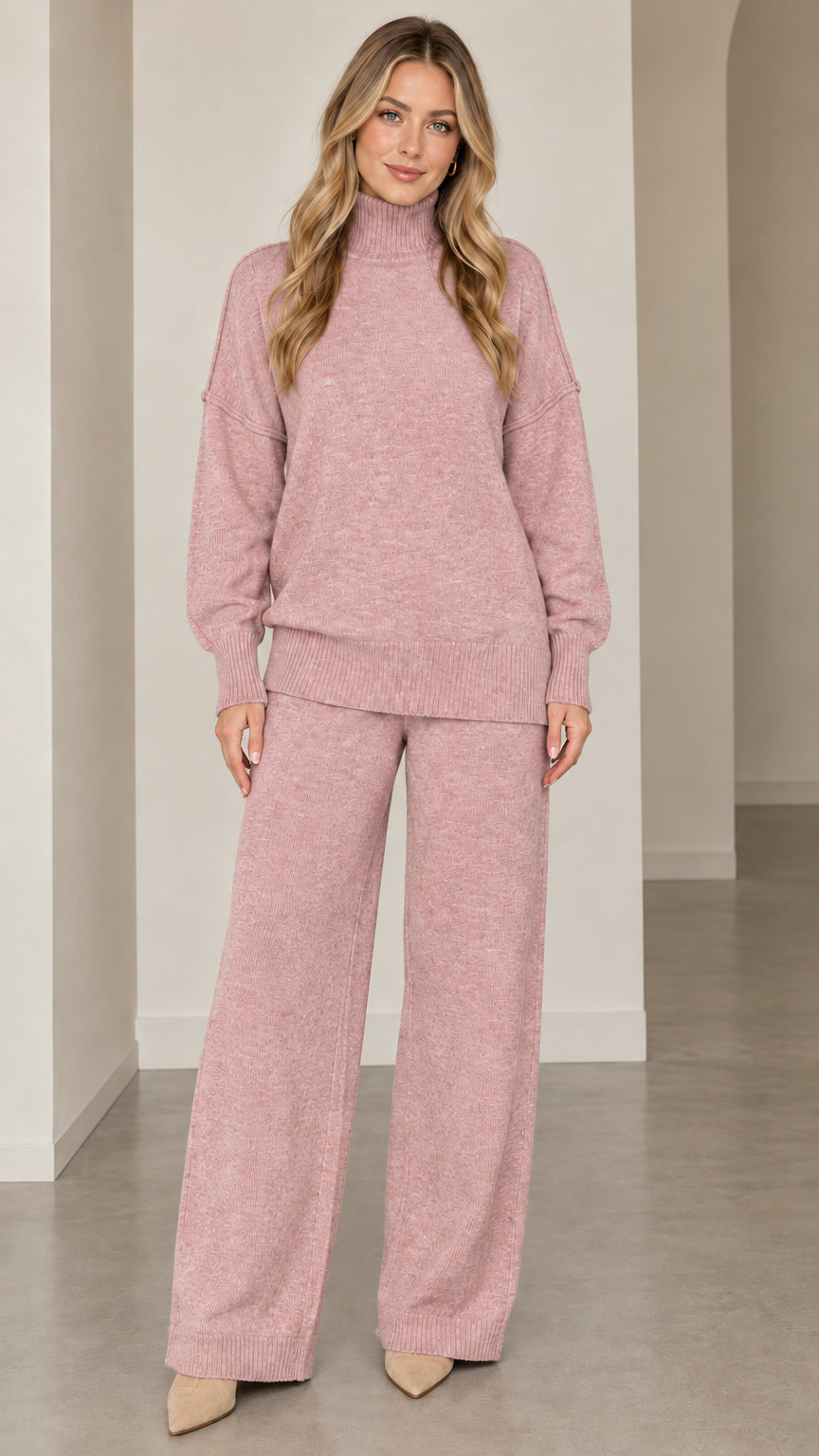 Front full-length view of model wearing dusty pink knit turtleneck sweater and matching wide-leg pants