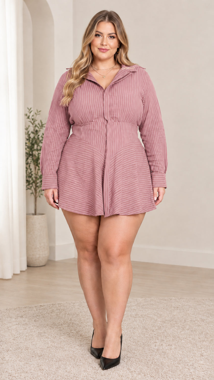 Front view of model wearing dusty pink striped long sleeve collared shirt dress