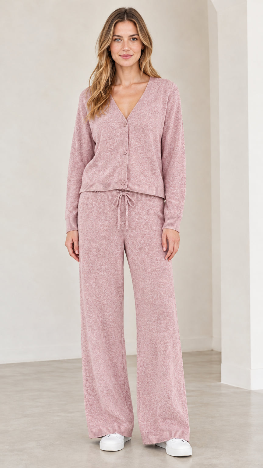 Front full view of woman wearing dusty pink knit cardigan and lounge pants set