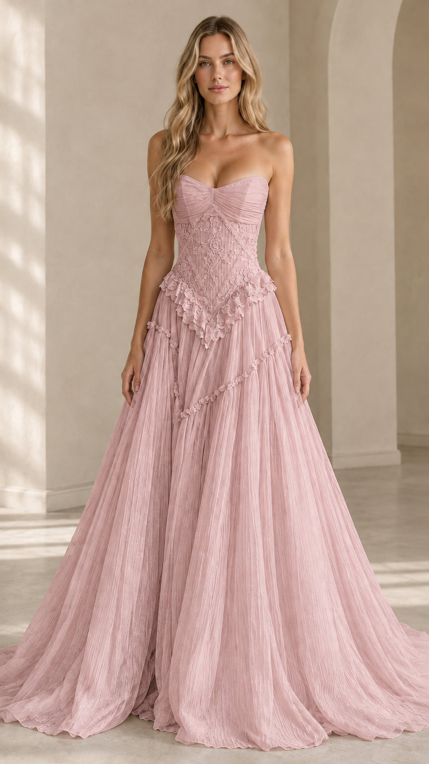 Front view of model wearing dusty pink strapless pleated tulle formal dress