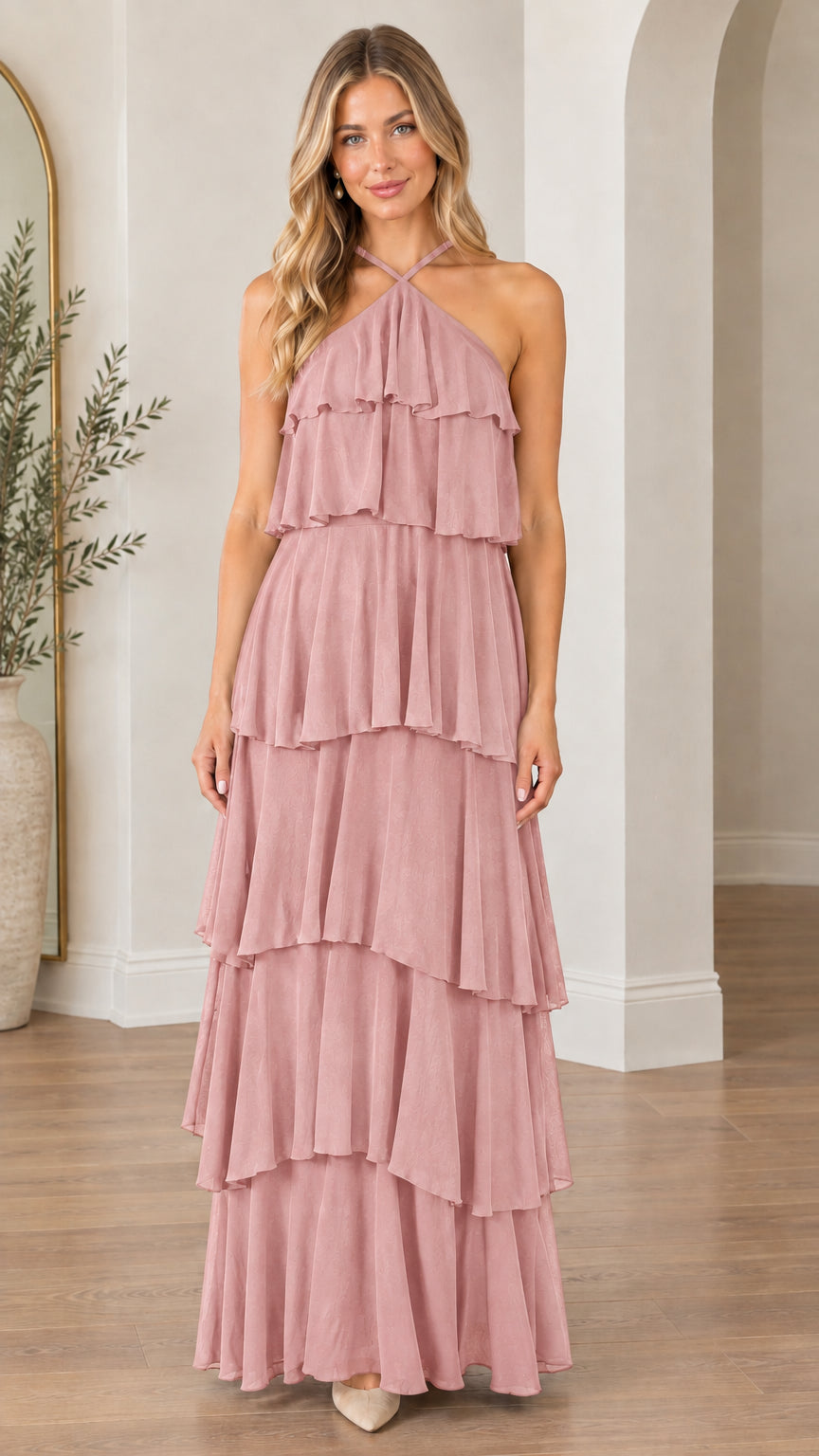 Model wearing dusty rose halter neck tiered ruffle maxi dress