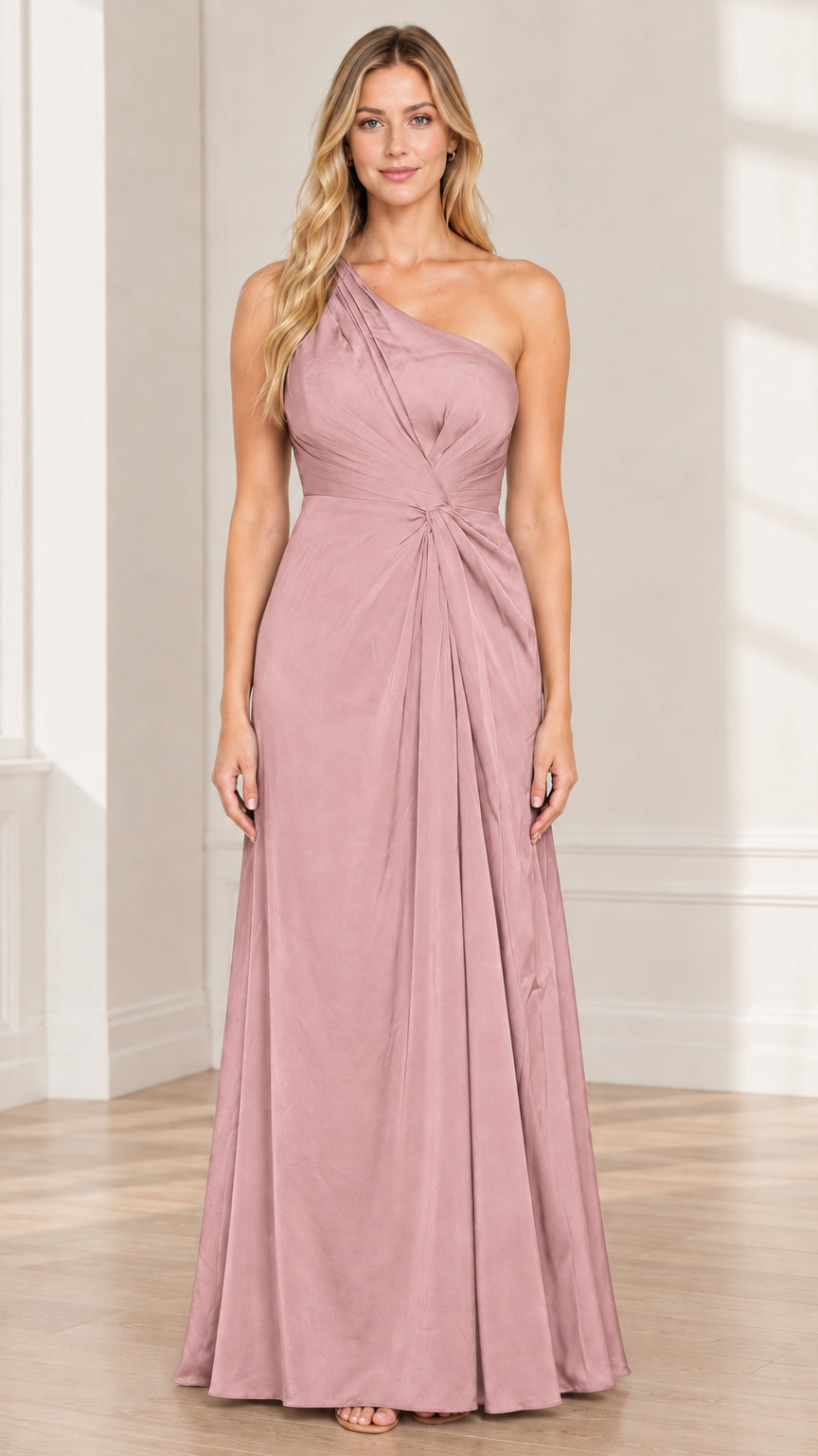 Woman wearing dusty rose pink one-shoulder pleated maxi gown