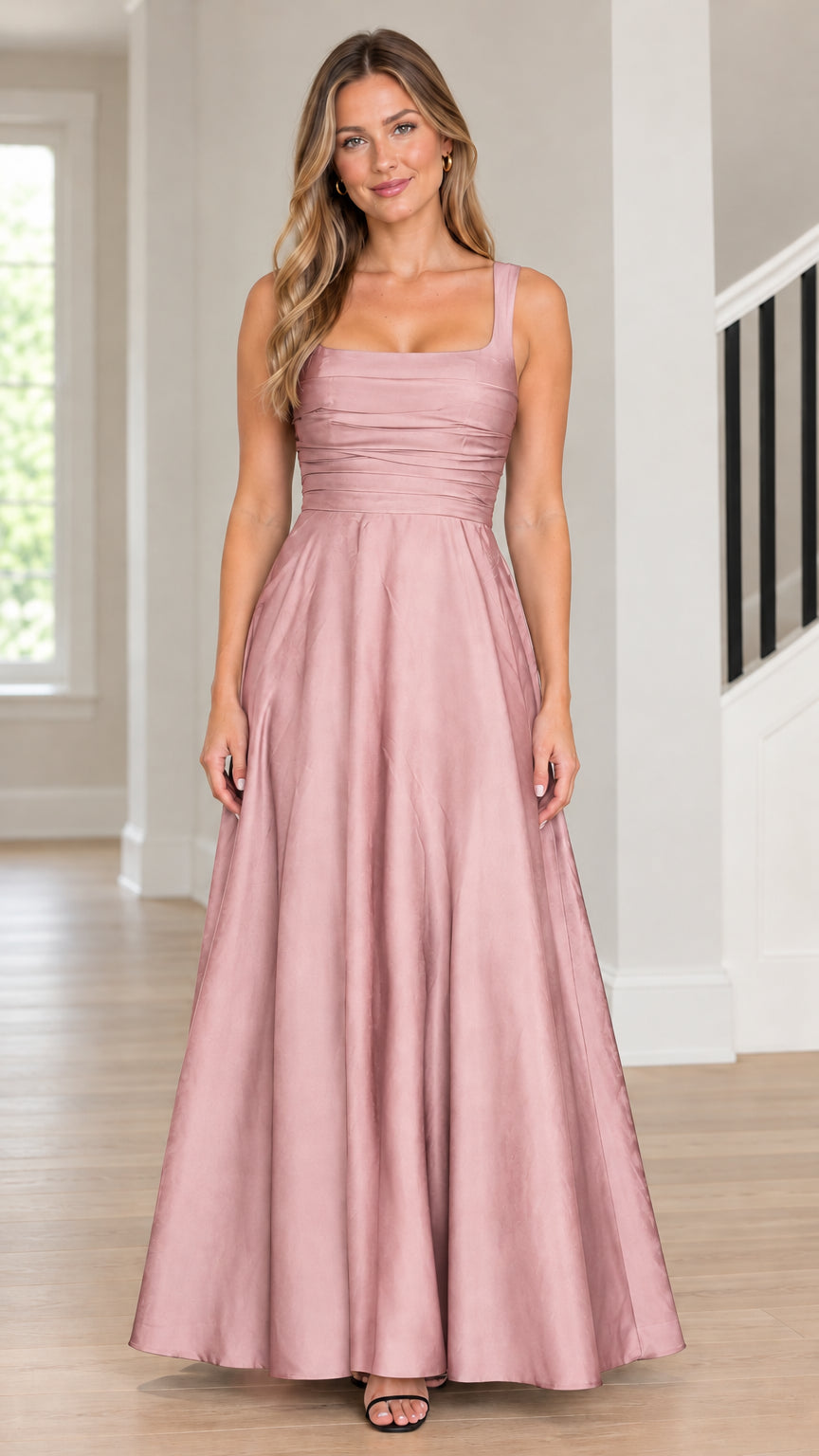 Model wearing dusty rose square neck pleated bodice satin A-line maxi dress front view