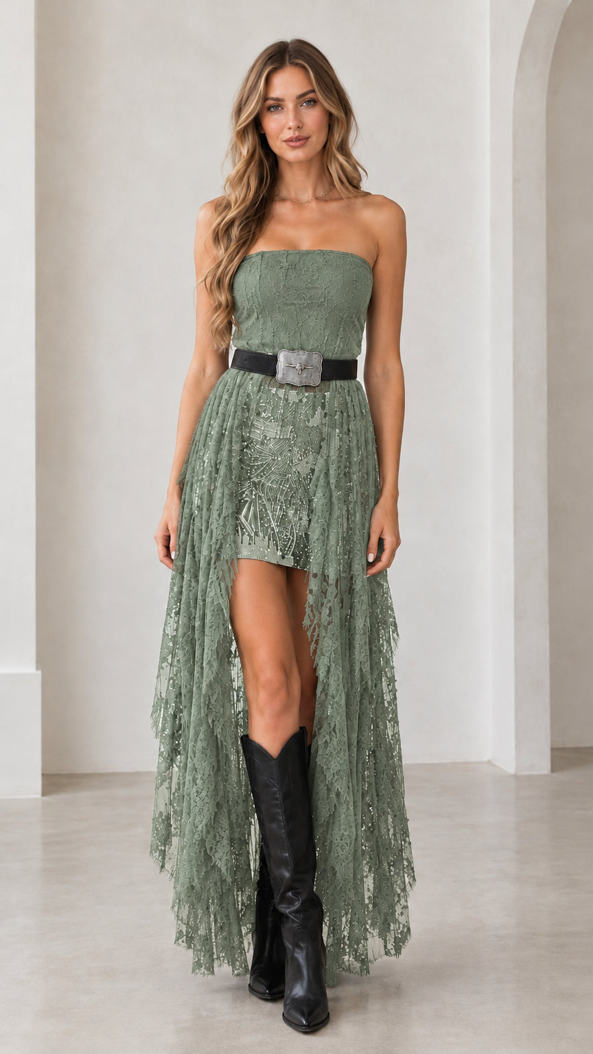 Model wearing sage green strapless high-low lace dress with western belt