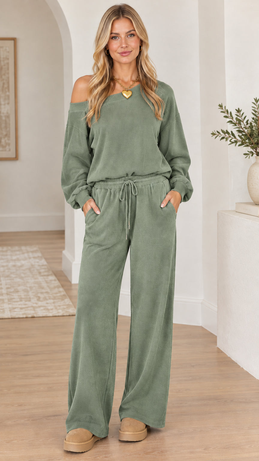 Full-length front view of woman wearing the lounge set in sage green