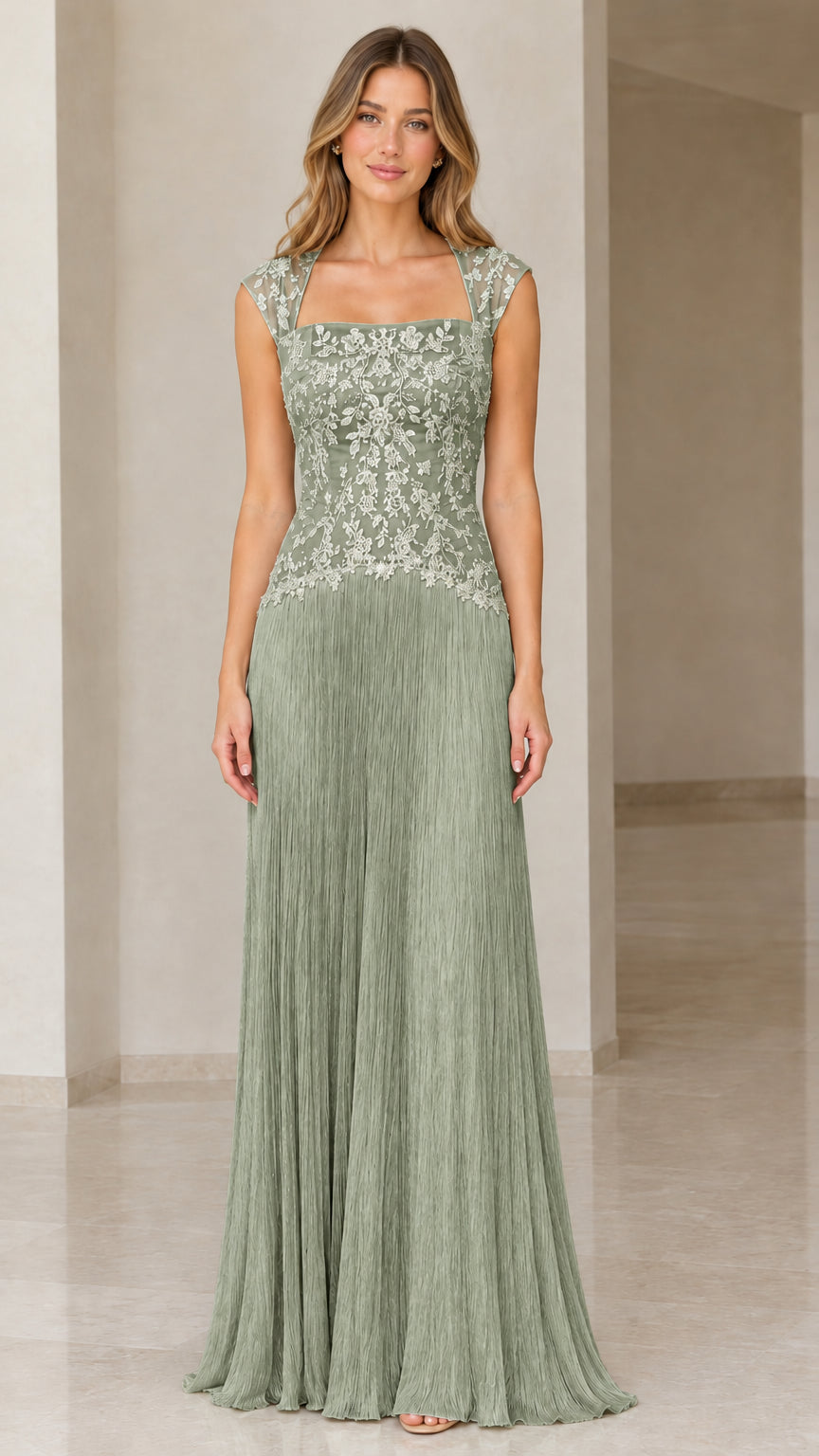 Sage green embroidered lace bodice gown with cascading fringe skirt