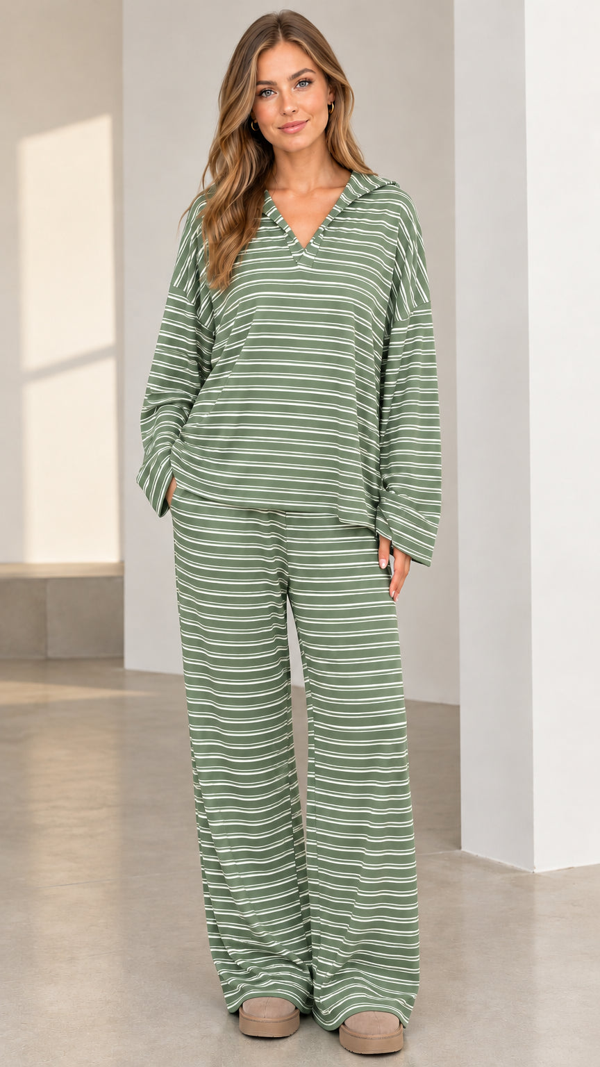 Woman wearing sage green and white striped long sleeve matching lounge set