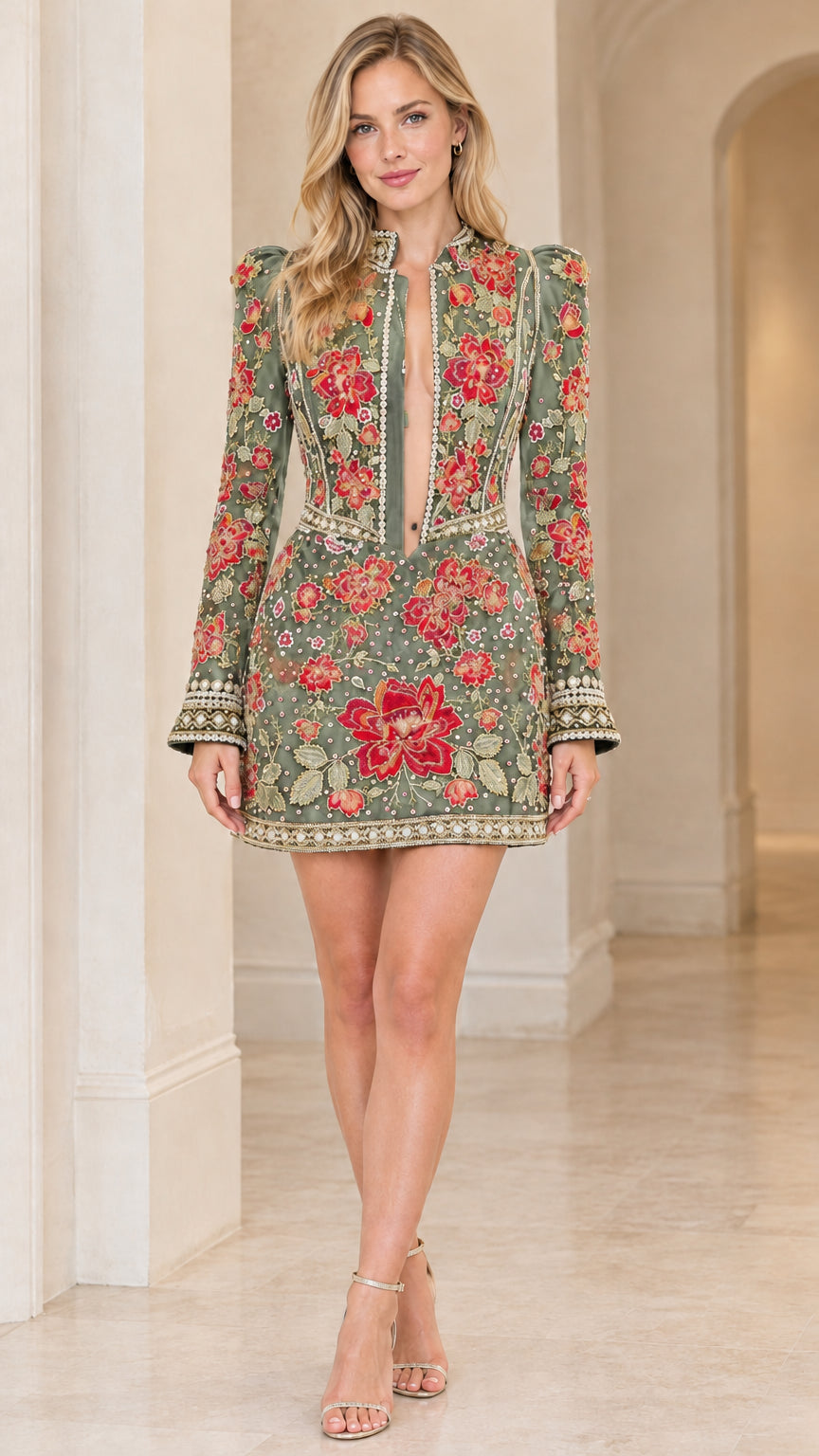 Front view of model wearing sage green floral embroidered long sleeve mini dress