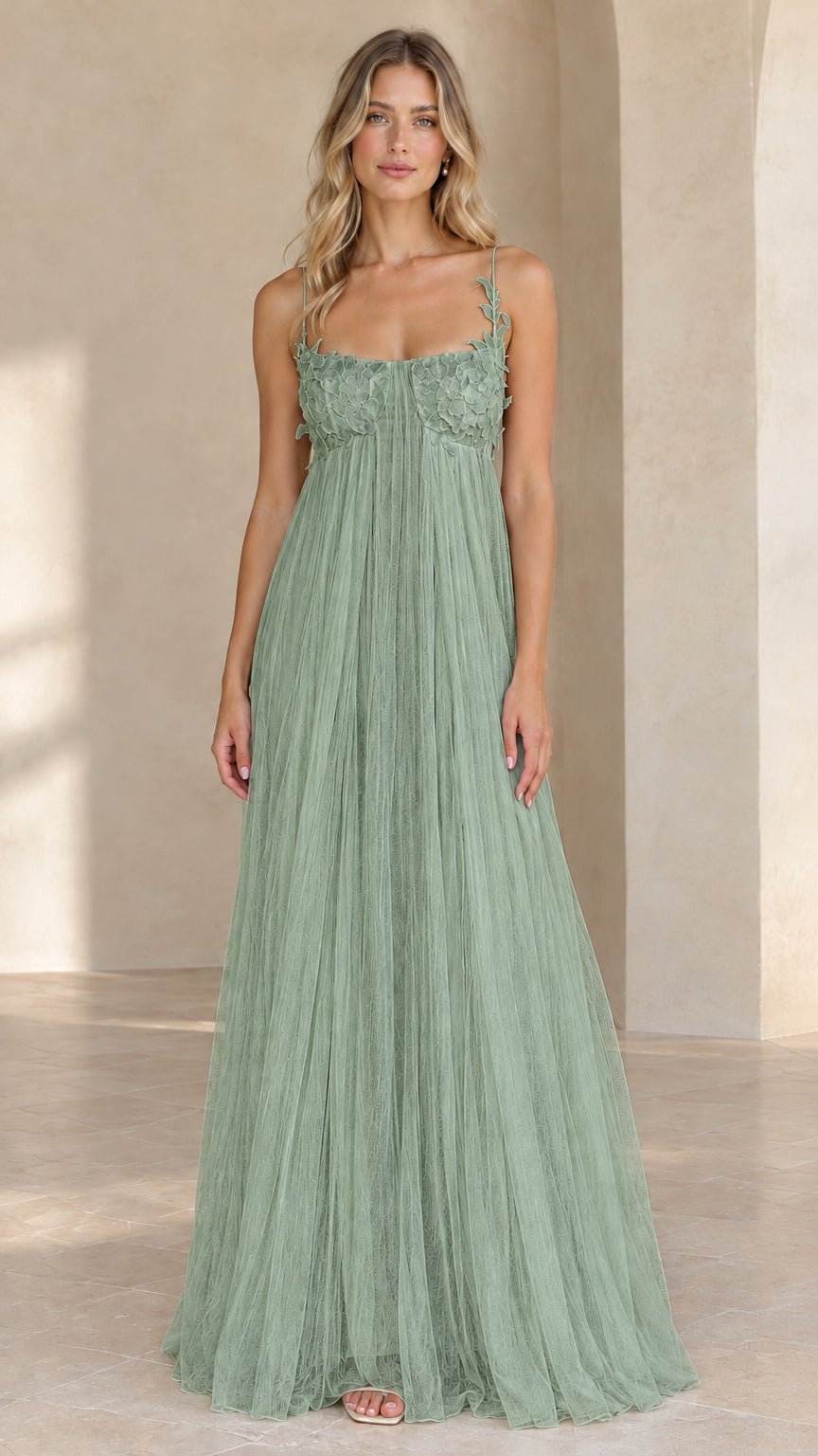 Full length view of sage green spaghetti strap tulle evening dress